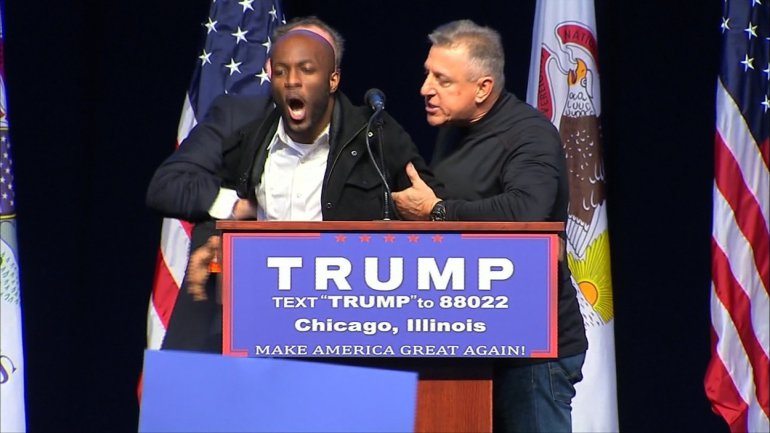 Donald Trump's campaign rally in Chicago on Friday was postponed amid growing security concerns. Several fights between Trump supporters and protesters could be seen after the announcement, as a large contingent of Chicago police officers moved in to restore order.